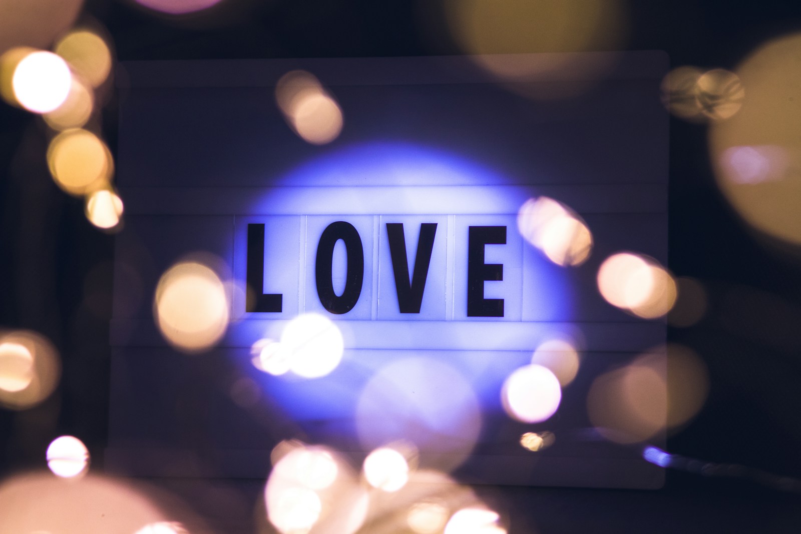 a close up of a light box with the word love on it
